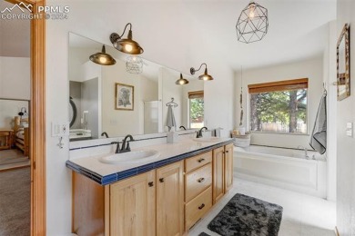 Custom-built ranch home nestled on a private 1+ acre lot w/easy on Shining Mountain Golf Club in Colorado - for sale on GolfHomes.com, golf home, golf lot