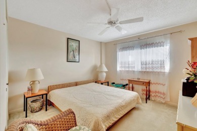 Step inside this beautiful, spacious 4th floor apartment and you on Poinciana Golf Club in Florida - for sale on GolfHomes.com, golf home, golf lot