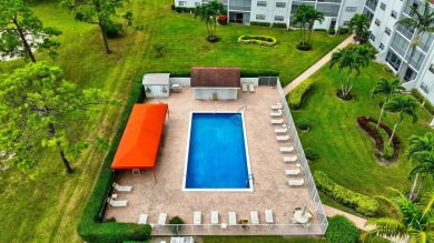 Step inside this beautiful, spacious 4th floor apartment and you on Poinciana Golf Club in Florida - for sale on GolfHomes.com, golf home, golf lot
