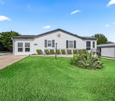 Located in the heart of the Villages, this charming 3-bedroom on Lakes of Lady Lake Golf Course in Florida - for sale on GolfHomes.com, golf home, golf lot