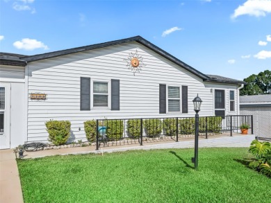 Located in the heart of the Villages, this charming 3-bedroom on Lakes of Lady Lake Golf Course in Florida - for sale on GolfHomes.com, golf home, golf lot