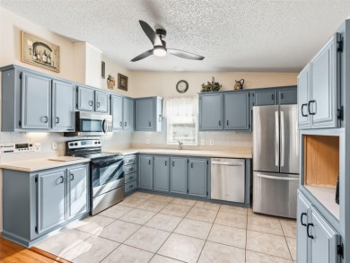 Located in the heart of the Villages, this charming 3-bedroom on Lakes of Lady Lake Golf Course in Florida - for sale on GolfHomes.com, golf home, golf lot