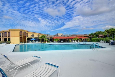 Step inside this beautiful, spacious 4th floor apartment and you on Poinciana Golf Club in Florida - for sale on GolfHomes.com, golf home, golf lot