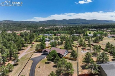 Custom-built ranch home nestled on a private 1+ acre lot w/easy on Shining Mountain Golf Club in Colorado - for sale on GolfHomes.com, golf home, golf lot