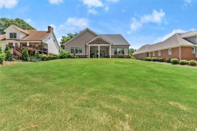 Welcome to this stunning 3,475 sq ft home nestled on a on Traditions of Braselton Golf Club in Georgia - for sale on GolfHomes.com, golf home, golf lot