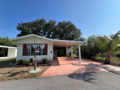 Charming 2 bed, 1.5 bath Home in 55+ Golf Community - New Roof on Lake Henry Golf Club in Florida - for sale on GolfHomes.com, golf home, golf lot