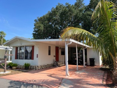 Charming 2 bed, 1.5 bath Home in 55+ Golf Community - New Roof on Lake Henry Golf Club in Florida - for sale on GolfHomes.com, golf home, golf lot