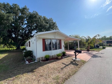 Charming 2 bed, 1.5 bath Home in 55+ Golf Community - New Roof on Lake Henry Golf Club in Florida - for sale on GolfHomes.com, golf home, golf lot