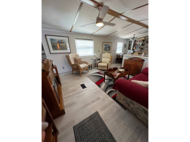 Charming 2 bed, 1.5 bath Home in 55+ Golf Community - New Roof on Lake Henry Golf Club in Florida - for sale on GolfHomes.com, golf home, golf lot