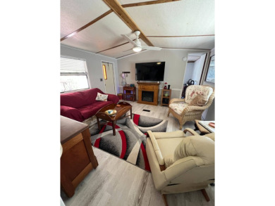 Charming 2 bed, 1.5 bath Home in 55+ Golf Community - New Roof on Lake Henry Golf Club in Florida - for sale on GolfHomes.com, golf home, golf lot