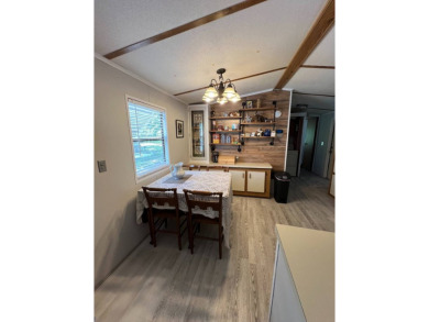 Charming 2 bed, 1.5 bath Home in 55+ Golf Community - New Roof on Lake Henry Golf Club in Florida - for sale on GolfHomes.com, golf home, golf lot
