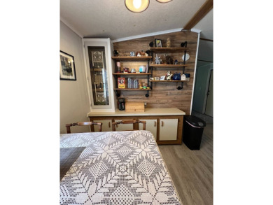 Charming 2 bed, 1.5 bath Home in 55+ Golf Community - New Roof on Lake Henry Golf Club in Florida - for sale on GolfHomes.com, golf home, golf lot