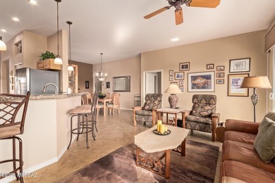 Sundrenched and move-in ready, this Extended Keystone model sits on Heritage Highlands At Dove Mountain in Arizona - for sale on GolfHomes.com, golf home, golf lot