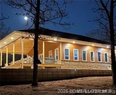 Step into the woods and back in time with this newly listed home on The Club At Old Kinderhook in Missouri - for sale on GolfHomes.com, golf home, golf lot