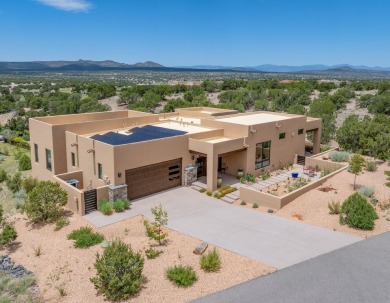 This recently constructed, open concept design residence on The Club At Las Campanas  in New Mexico - for sale on GolfHomes.com, golf home, golf lot