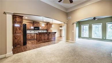 Exceptional property located in maintenance-free Siena on Fred Arbanas Golf Course At Longview Lakes - Longview Lake in Missouri - for sale on GolfHomes.com, golf home, golf lot