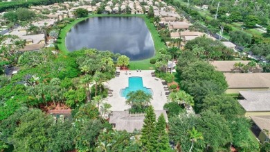 Great price, great one story 3 bedroom 2 bath house with a pool on Broken Sound Golf and Club  in Florida - for sale on GolfHomes.com, golf home, golf lot