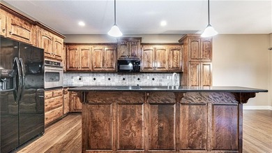 Exceptional property located in maintenance-free Siena on Fred Arbanas Golf Course At Longview Lakes - Longview Lake in Missouri - for sale on GolfHomes.com, golf home, golf lot