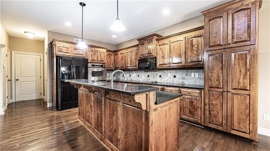 Exceptional property located in maintenance-free Siena on Fred Arbanas Golf Course At Longview Lakes - Longview Lake in Missouri - for sale on GolfHomes.com, golf home, golf lot