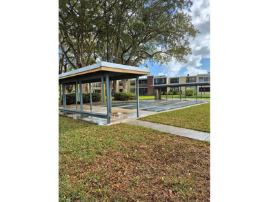 Enjoy the Florida lifestyle in this charming first-floor condo on  in Florida - for sale on GolfHomes.com, golf home, golf lot