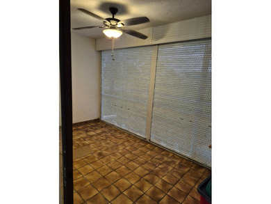 Enjoy the Florida lifestyle in this charming first-floor condo on  in Florida - for sale on GolfHomes.com, golf home, golf lot