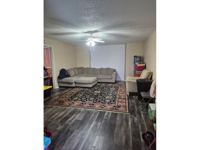 Enjoy the Florida lifestyle in this charming first-floor condo on  in Florida - for sale on GolfHomes.com, golf home, golf lot