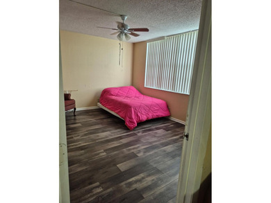 Enjoy the Florida lifestyle in this charming first-floor condo on  in Florida - for sale on GolfHomes.com, golf home, golf lot