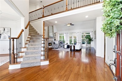 Experience luxury living at its finest with this stunning on Collins Hill Golf Club in Georgia - for sale on GolfHomes.com, golf home, golf lot