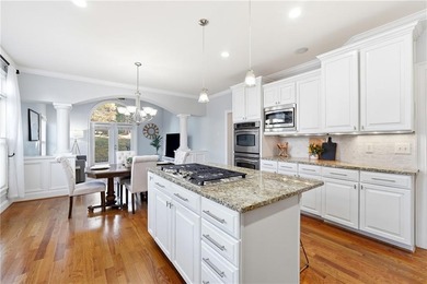 Experience luxury living at its finest with this stunning on Collins Hill Golf Club in Georgia - for sale on GolfHomes.com, golf home, golf lot