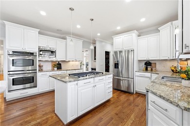 Experience luxury living at its finest with this stunning on Collins Hill Golf Club in Georgia - for sale on GolfHomes.com, golf home, golf lot