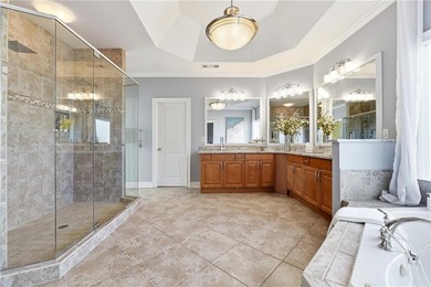 Experience luxury living at its finest with this stunning on Collins Hill Golf Club in Georgia - for sale on GolfHomes.com, golf home, golf lot