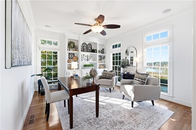 Experience luxury living at its finest with this stunning on Collins Hill Golf Club in Georgia - for sale on GolfHomes.com, golf home, golf lot