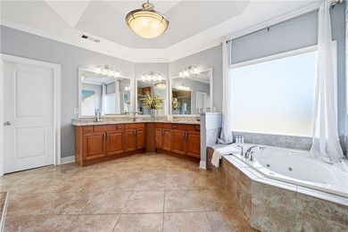 Experience luxury living at its finest with this stunning on Collins Hill Golf Club in Georgia - for sale on GolfHomes.com, golf home, golf lot