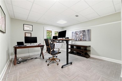 Experience luxury living at its finest with this stunning on Collins Hill Golf Club in Georgia - for sale on GolfHomes.com, golf home, golf lot