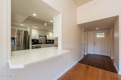 This spacious 3-bedroom, 2-bath residence offers 1,832 sq ft of on PalmBrook Country Club in Arizona - for sale on GolfHomes.com, golf home, golf lot