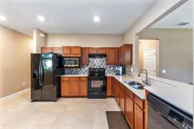 Experience carefree living with a dedicated Guest Suite for on Stone Creek Golf Club in Florida - for sale on GolfHomes.com, golf home, golf lot