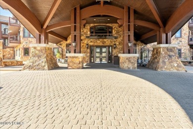 This luxury Waldorf Astoria condominium is set in the Canyons on Canyons Golf Course in Utah - for sale on GolfHomes.com, golf home, golf lot