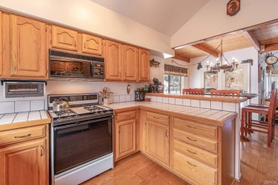 SPACIOUS BEAR MEADOWS CONDO WITH GOLF COURSE AND MOUNTAIN VIEWS on Big Bear Mountain Ski and Golf Resort in California - for sale on GolfHomes.com, golf home, golf lot