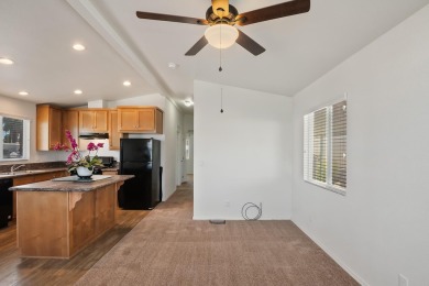 Discover resort-style living in the heart of Cathedral City's on Cathedral Canyon Golf and Tennis Club in California - for sale on GolfHomes.com, golf home, golf lot