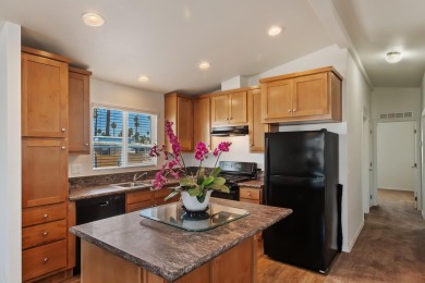 Discover resort-style living in the heart of Cathedral City's on Cathedral Canyon Golf and Tennis Club in California - for sale on GolfHomes.com, golf home, golf lot