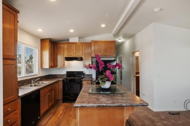 Discover resort-style living in the heart of Cathedral City's on Cathedral Canyon Golf and Tennis Club in California - for sale on GolfHomes.com, golf home, golf lot