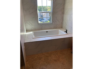 Located in the highly desirable Bent Oak Estates community in on Whispering Pines in South Carolina - for sale on GolfHomes.com, golf home, golf lot