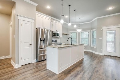 This custom home is ready for new owners to love, move in ready on The Retreat in Texas - for sale on GolfHomes.com, golf home, golf lot