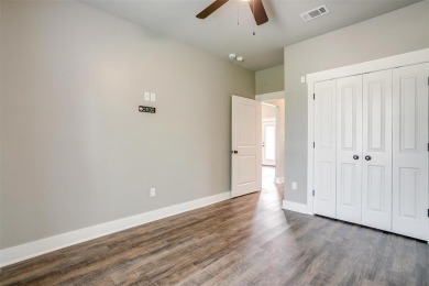This custom home is ready for new owners to love, move in ready on The Retreat in Texas - for sale on GolfHomes.com, golf home, golf lot