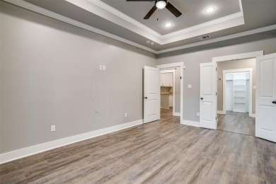 This custom home is ready for new owners to love, move in ready on The Retreat in Texas - for sale on GolfHomes.com, golf home, golf lot
