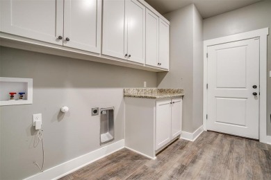 This custom home is ready for new owners to love, move in ready on The Retreat in Texas - for sale on GolfHomes.com, golf home, golf lot