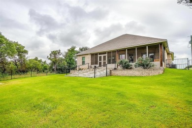 This custom home is ready for new owners to love, move in ready on The Retreat in Texas - for sale on GolfHomes.com, golf home, golf lot