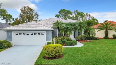 Beautifully-maintained Heron home nestled in HERONS GLEN COUNTRY on Herons Glen Golf and Country Club in Florida - for sale on GolfHomes.com, golf home, golf lot