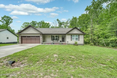 This beautifully maintained 2023 built 2 bed 2 bath home on Lake Tansi Village Country Club in Tennessee - for sale on GolfHomes.com, golf home, golf lot