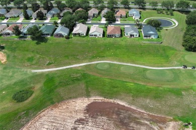Charming single story on coveted Prairie Dunes! Elevated above on Sanctuary Ridge Golf in Florida - for sale on GolfHomes.com, golf home, golf lot
